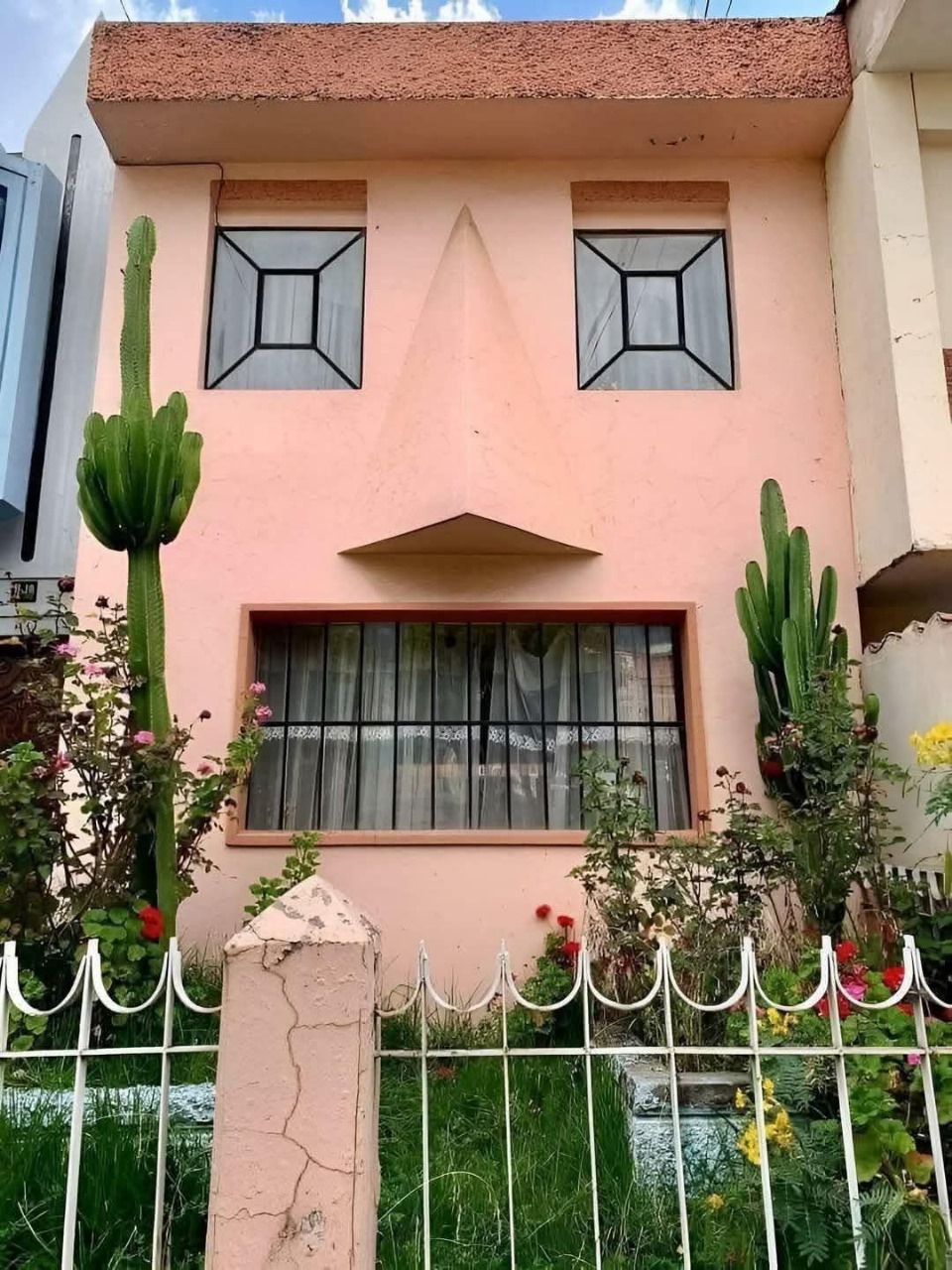A house as the central subject of the image.