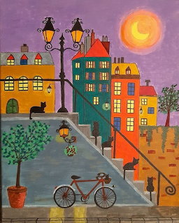 Colorful folk art painting of a city street at night with buildings, cats, bicycle, and crescent moon