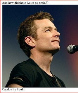 Close-up of a male performer looking upward toward a microphone on stage