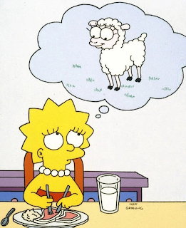 Lisa Simpson at table with meal, thought bubble showing sheep above