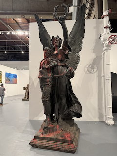 Winged Angel Sculpture in Gallery