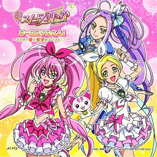 Anime magical girls in colorful frilly costumes with a small white mascot on a pink background