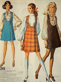 Vintage sewing pattern illustration of three women in 1960s jumper dresses with blouses
