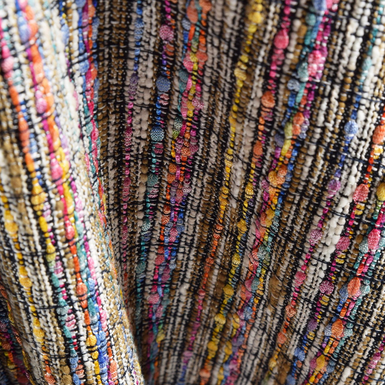 Close-up of multicolored woven fabric with vertical striped pattern