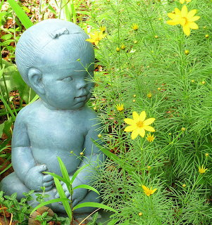 Garden Baby Statue with Coreopsis