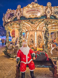 Santa by Carousel