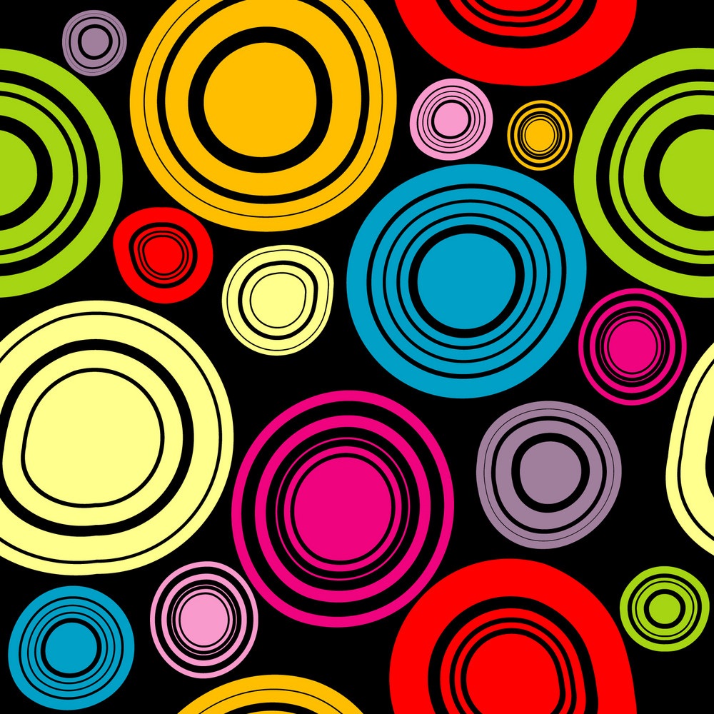 Vibrant pattern of colorful concentric circles in various sizes on black background