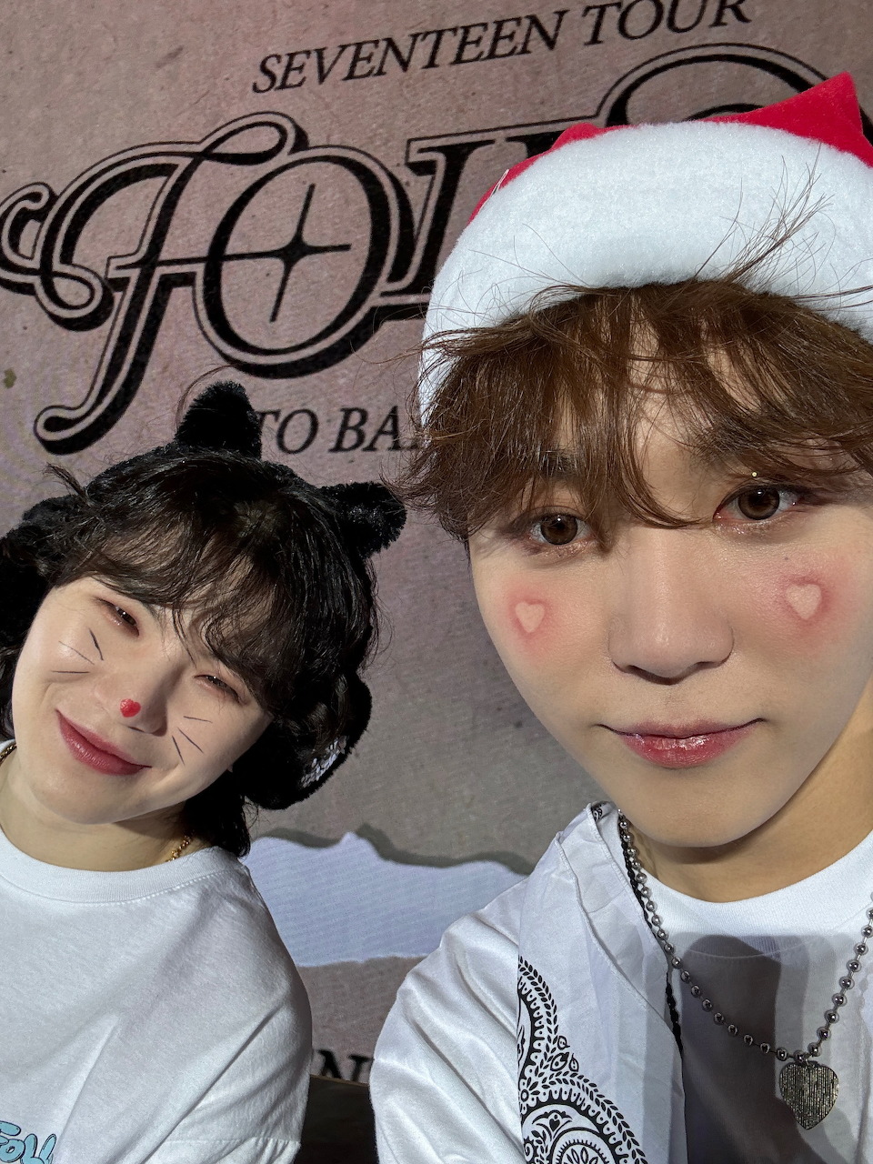 Woozi and Seungkwan from Seventeen posing together