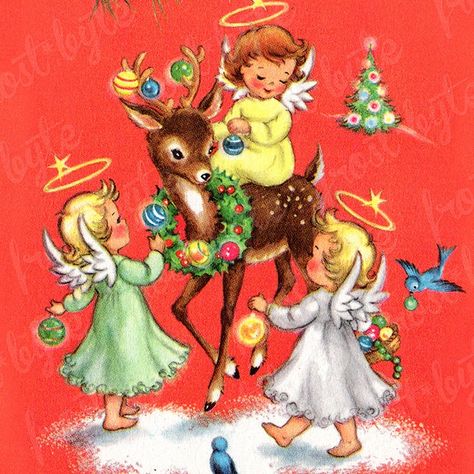 Three child angels in pastel dresses decorating a reindeer with Christmas ornaments on red background
