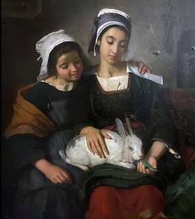 Painting of two young girls in Breton caps gently holding a white rabbit on their laps
