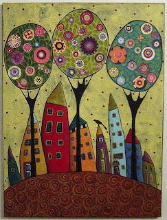 Folk art painting of colorful houses and ornate round trees with floral designs on a green background