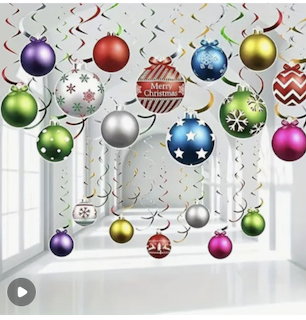 Colorful Christmas ball ornaments and curling streamers hanging as holiday room decorations