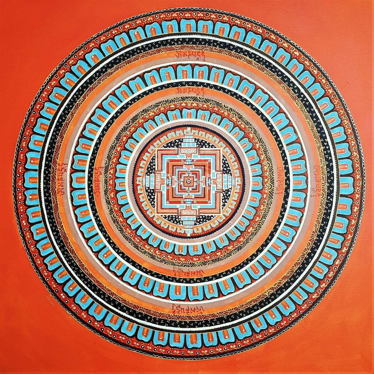 Circular mandala with turquoise and coral geometric patterns on orange background