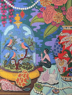 Colorful Mexican folk art tapestry with embroidered birds, flowers, and traditional patterns