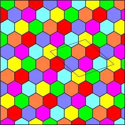 Colorful tessellating hexagon pattern with bright red, blue, green, yellow, orange, magenta, and cyan tiles
