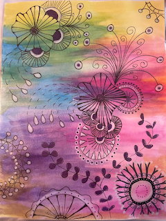 Abstract watercolor painting with swirling floral patterns and circles in rainbow colors