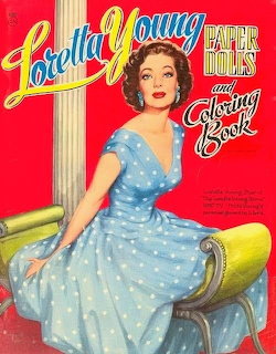 Vintage Loretta Young paper dols and coloring book cover with woman in blue polka dot dress