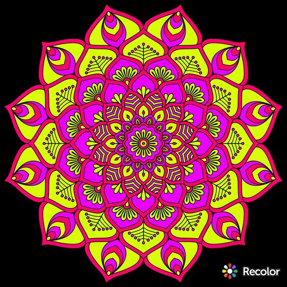 Colorful symmetrical mandala with concentric circles and layered petal patterns in magenta, yellow, and orange