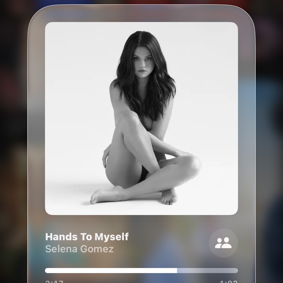 Music player screen showing black and white album art of a seated woman with song and artist info