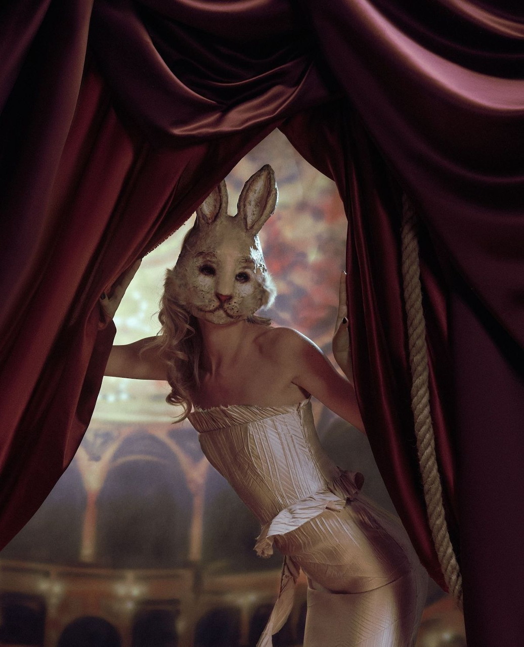Dark fantasy illustration of Alice and a rabbit in a midnight circus scene
