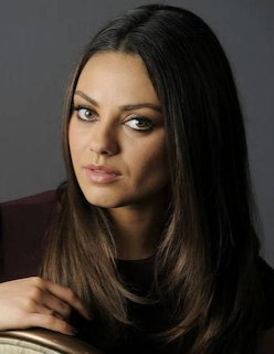 Portrait photo of Mila Kunis with long brown hair