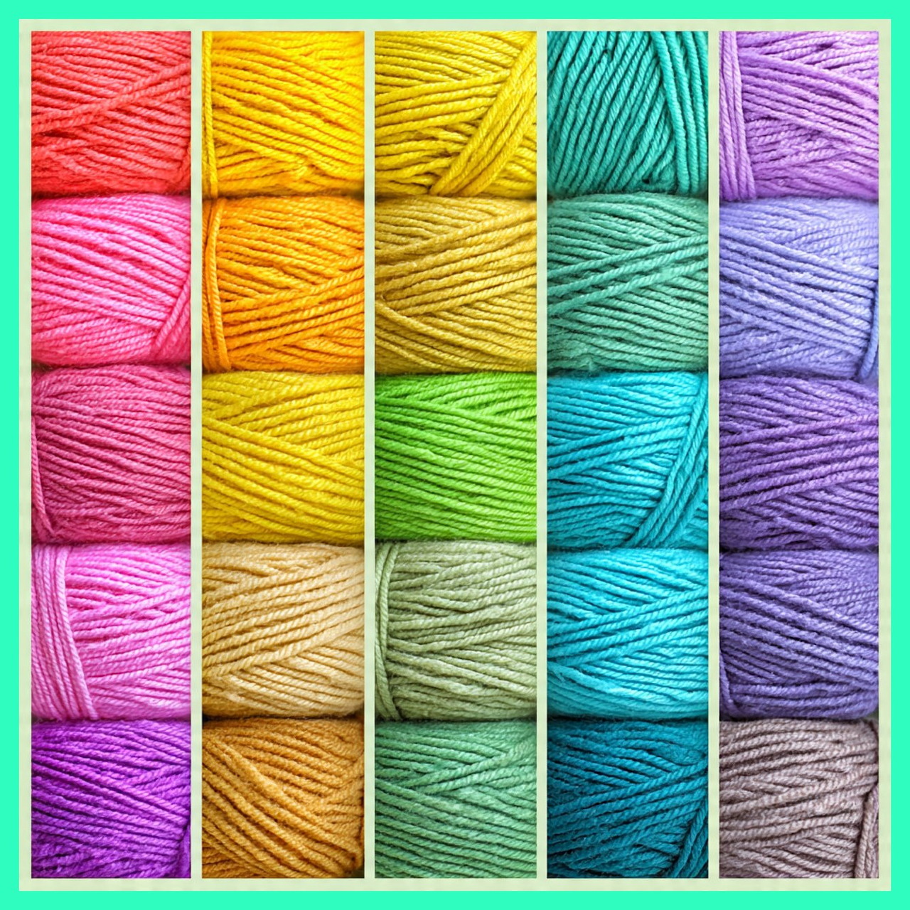 Colorful yarn spools arranged in a rainbow grid pattern