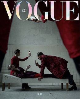 Vogue CS Kids magazine cover with three children posing theatrically on a bench under red curtains