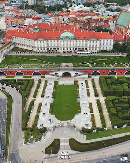 Aerial view of Warsaw Royal Castle Kubicki Arcades with formal geometric gardens and red roof