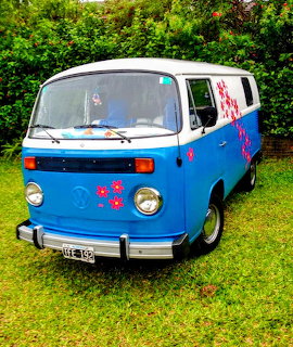 Blue Volkswagen Van with Flowers