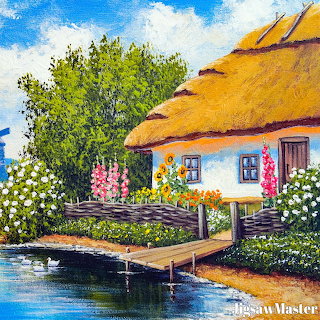 Thatched Cottage by Water