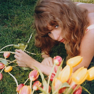 Woman with Tulips on Grass