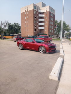 Red Camaro Parking Lot