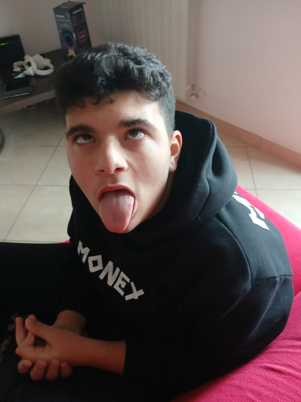 Young Man Sticking Tongue Out