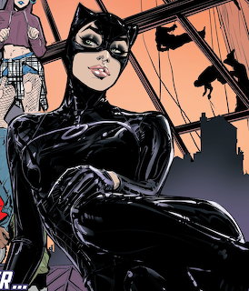 Catwoman in black suit and mask crouching on rooftop with city skyline behind