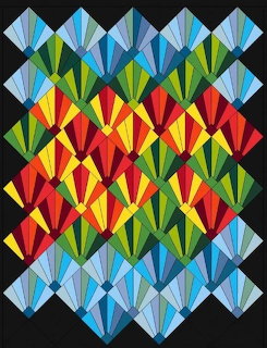 Colorful quilt with overlapping diamond pattern in blue, green, yellow, red, and orange on black