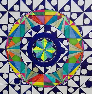 Colorful geometric mandala with blue and white patterned background