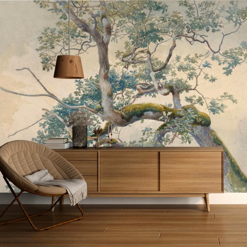 Modern room with wooden sideboard, chair, hanging lamp, and tree branches mural on the wall