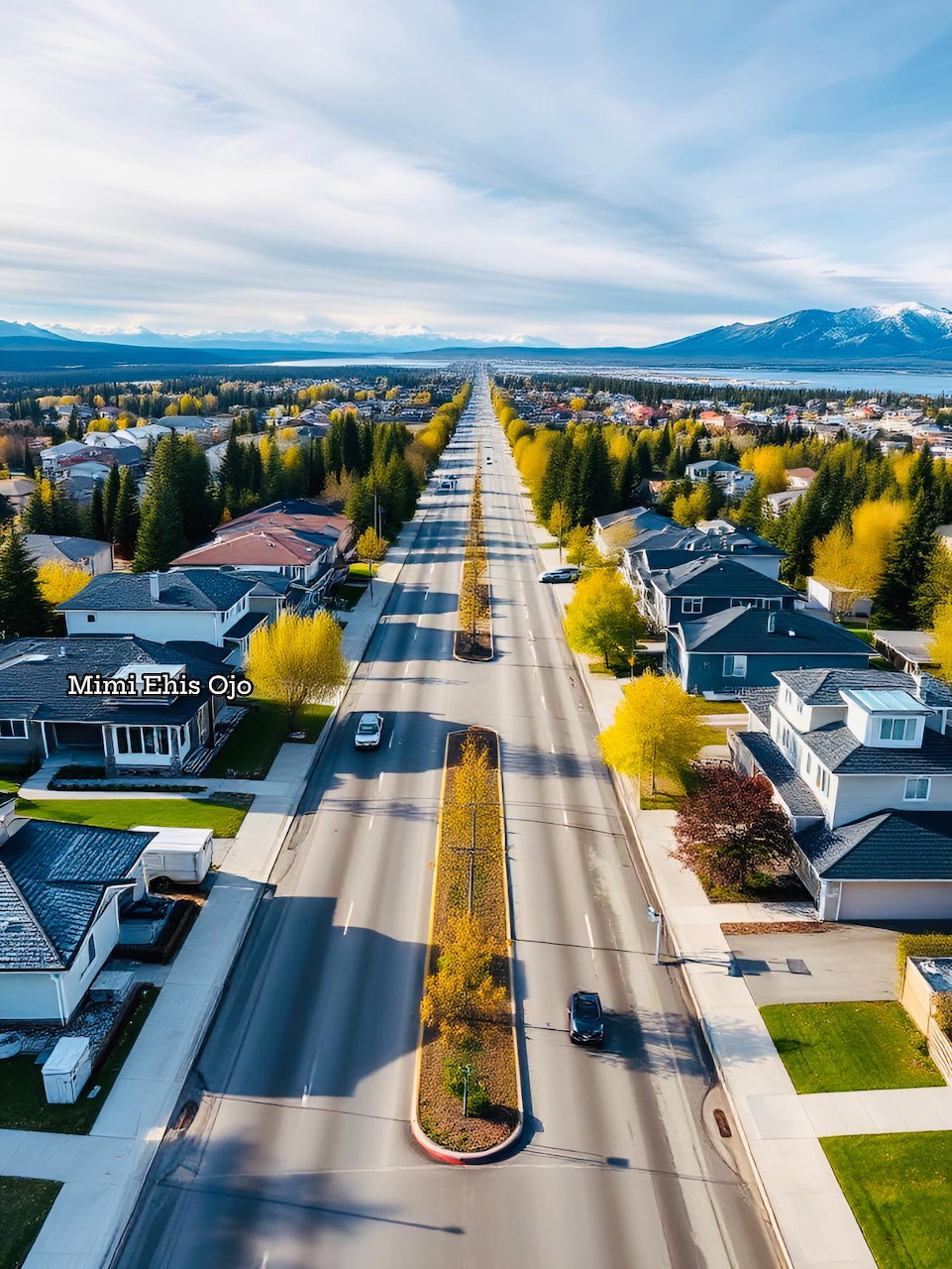 Anchorage Alaska cityscape with snow-capped mountains in the background
