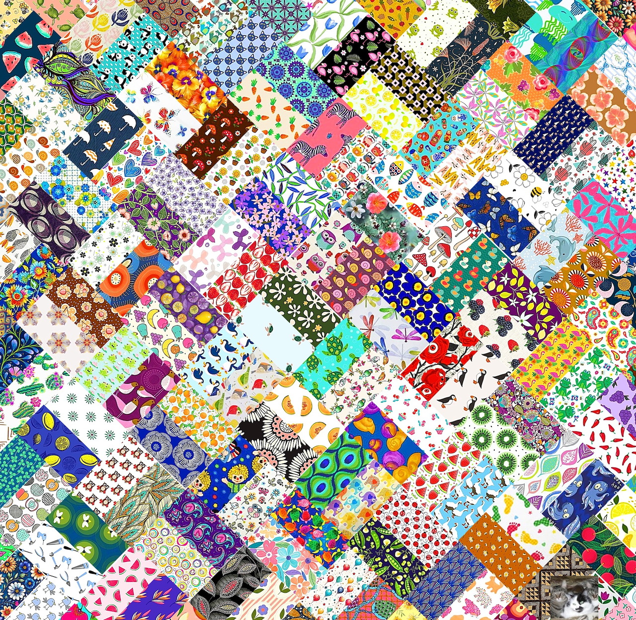 Colorful patchwork quilt with diverse fabric patterns including dots, florals, and geometric shapes