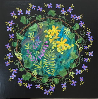 Circular floral mandala with yellow flowers, purple blossoms, and green foliage on dark background