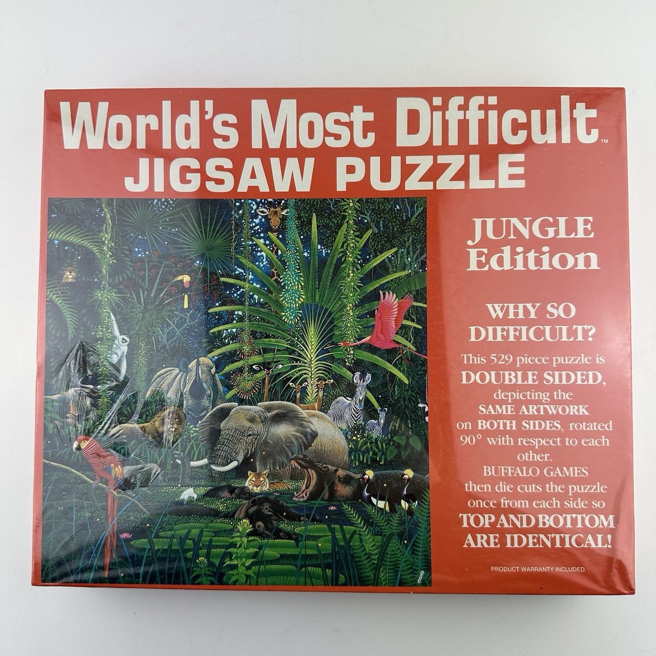 Square photo of a red World's Most Difficult Jigsaw Puzzle box with a jungle scene on the front