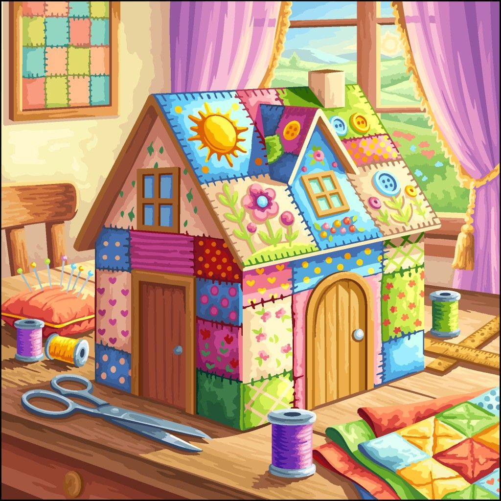 Small decorative house covered in colorful patchwork fabric squares with sewing supplies around it