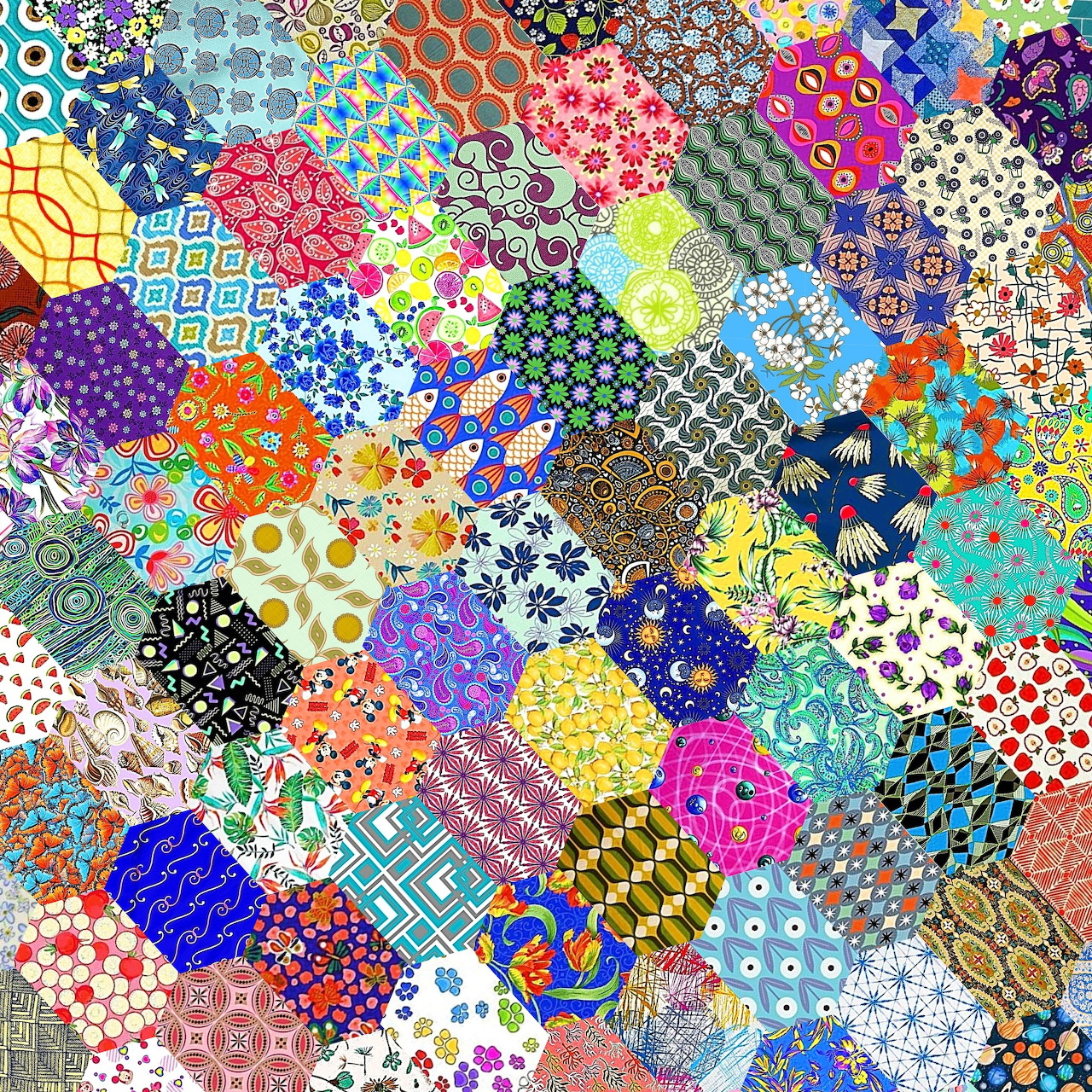 Colorful hexagonal patchwork quilt with various patterns and designs arranged in a mosaic layout