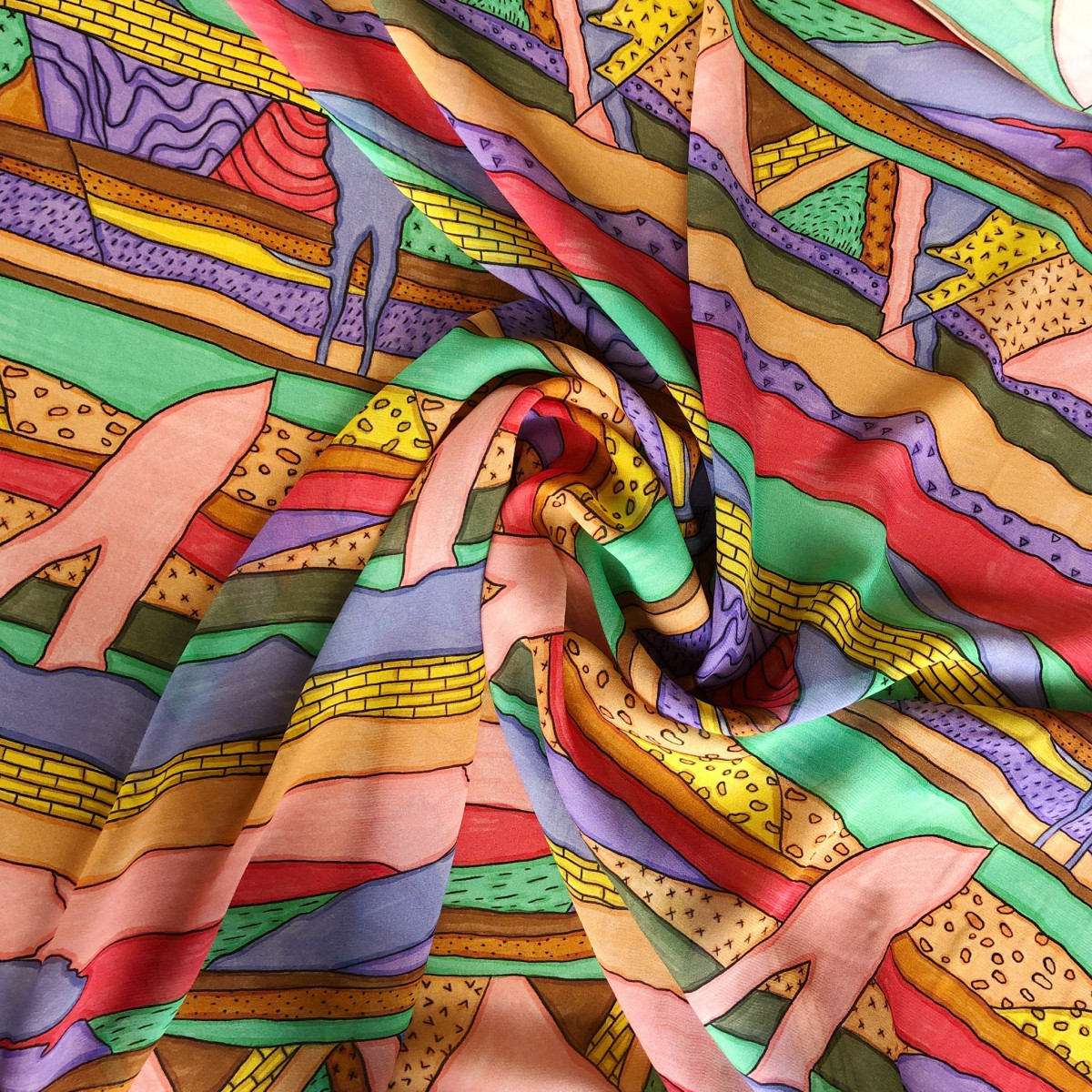 Colorful abstract folds of ribbon-like shapes with striped and patterned textures