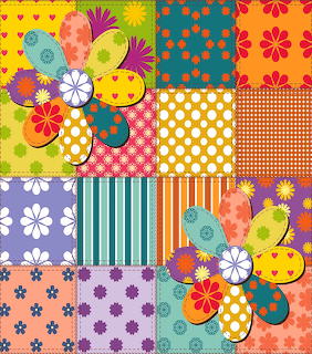Colorful patchwork quilt design with decorative layered flowers on patterned fabric squares