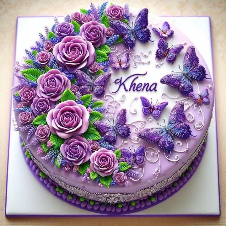 Round cake decorated with purple roses, small flowers, and purple butterflies on white frosting with name Khena
