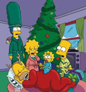 The Simpsons family posing together next to a Christmas tree in their living room