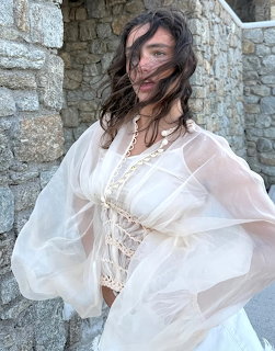 Woman in White Flowing Dress
