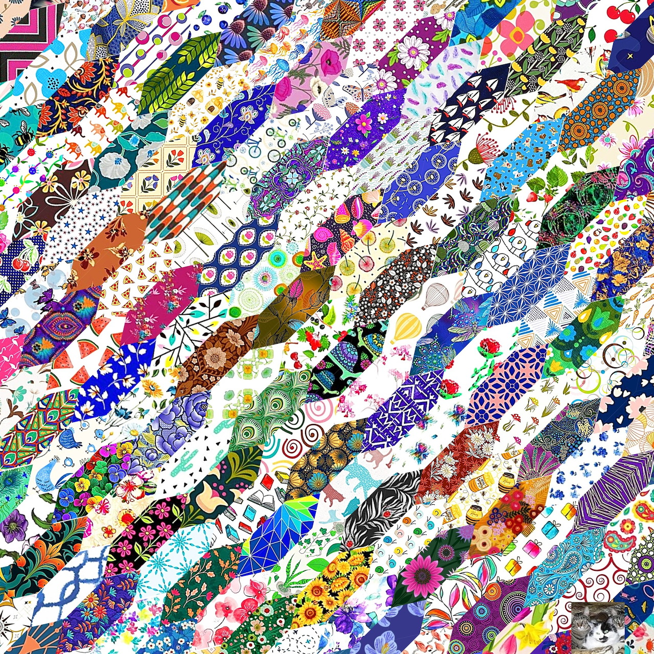 Diagonal patchwork quilt with colorful fabric strips in floral, geometric and polka dot patterns
