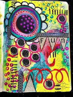 Colorful abstract art with circles, patterns, and geometric shapes in pink, blue, and yellow